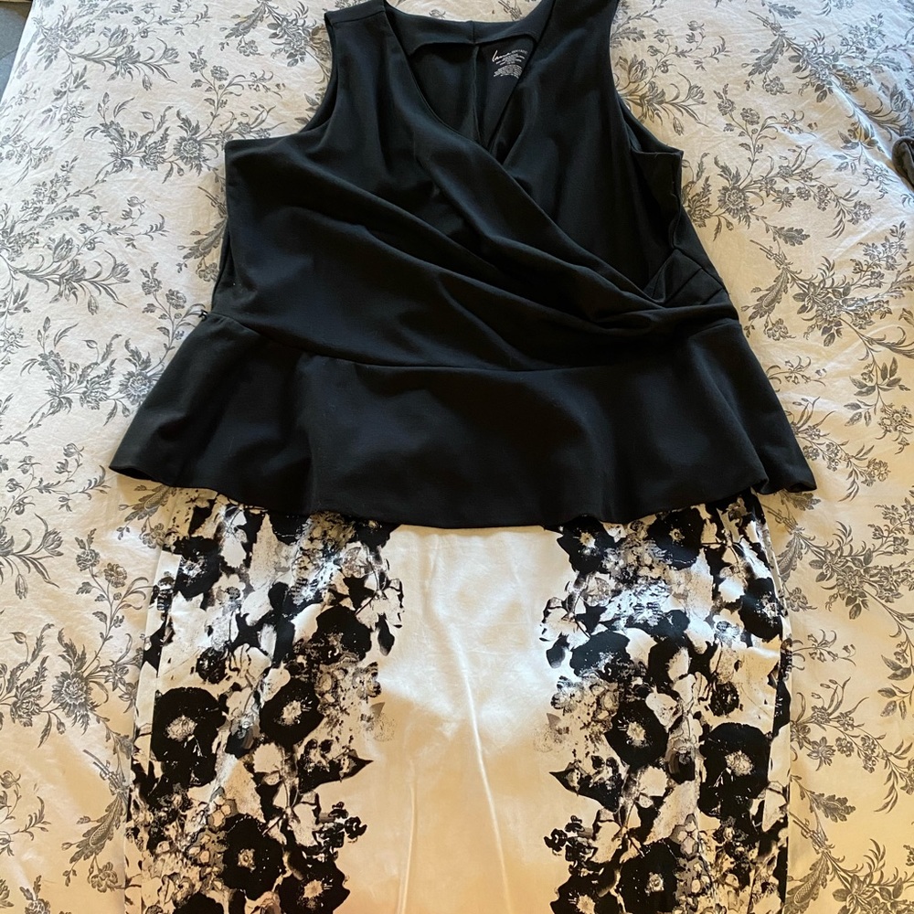 Sleeveless top and knee length skirt